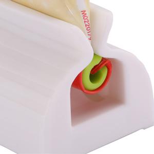 A set of 4 toothpaste tube rollers - manual squeeze tool, toothbrush squeezer, clip holder/winder, colors random. A set of 4 toothpaste tube rollers - manual squeeze tool, toothbrush squeezer, clip holder/winder, colors random.