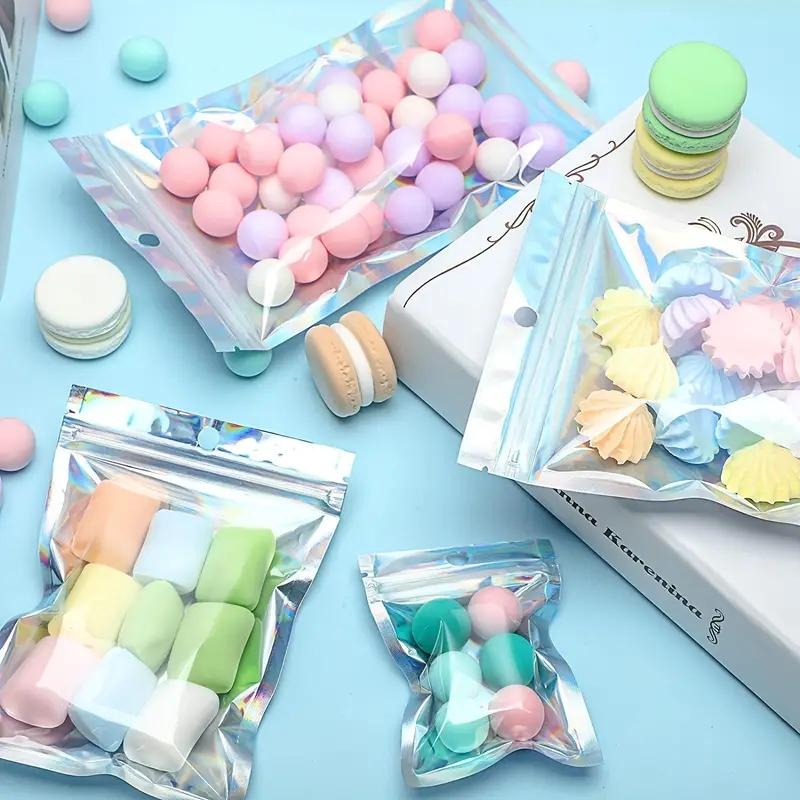 100pcs Holographic Resealable Mylar Bags Ziplock Candy Suger Tee Jewelry Beauty Storage Bag 100pcs Holographic Resealable Mylar Bags Ziplock Candy Suger Tee Jewelry Beauty Storage Bag
