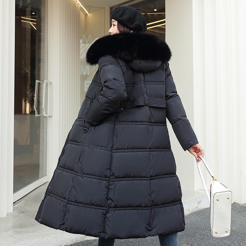 New winter women's thickened long over-the-knee hooded cotton-padded coat with large fur collar.