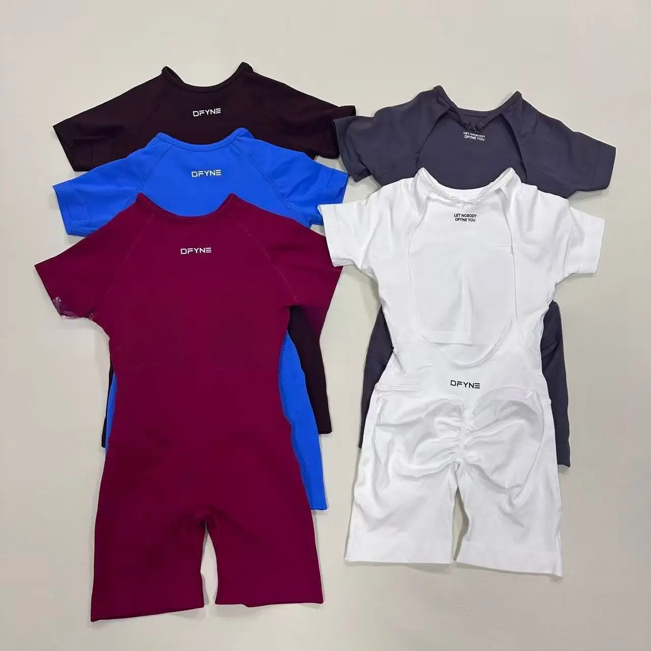 DFYNE Women's Open Back Seamless Short-Sleeve Lightweight Knit Gym Romper - Female Form-Fitting Anti-Chafing Bodysuit, Pilates Wear with Optimized Bodysuit Length for Festivals