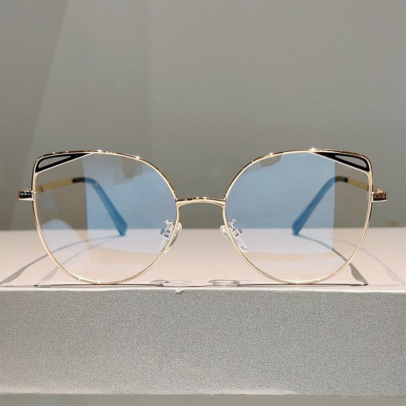 High quality cat eye hollow metal eyeglass frame fashion simple anti blue light glasses for women Computer goggles flat lens