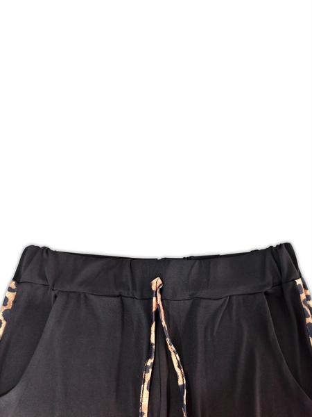 A 2-piece set of women's fashionable slanted shoulder collar leopard print long sleeved shirt and lace up pants, suitable for daily versatile occasions and home sports wear