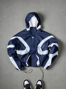 2026 New Men Y2K Streetwear Color Block Hooded Windbreaker Jacket, Fashionable Jacket, Geometric Contrast Panel Techwear Coat Adjustable Drawstring Hem Zip Pocket Lightweight Windproof Outerwear Black Navy Light Gray Multi Colors Available