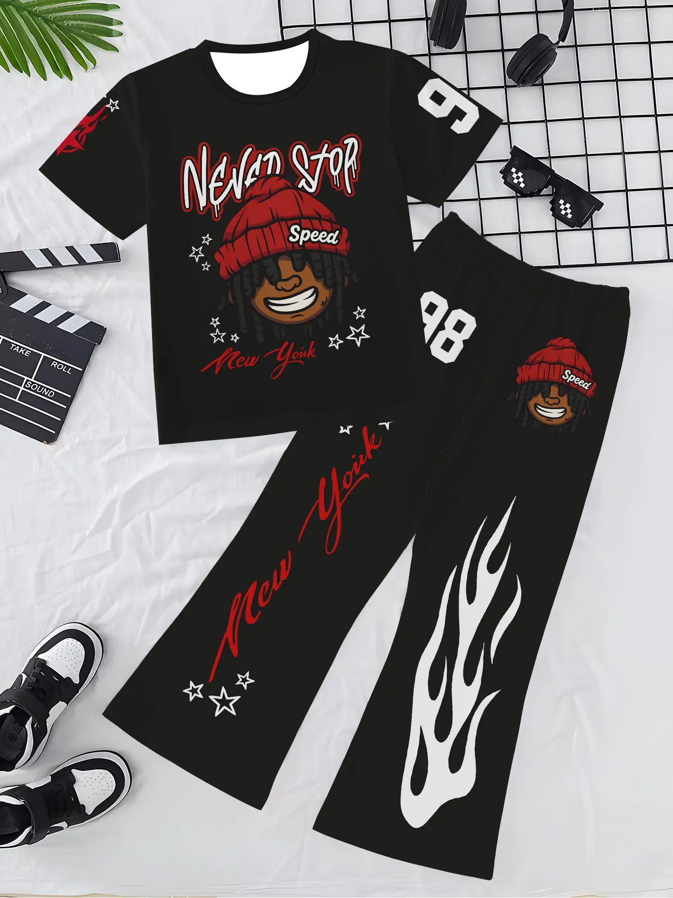 Toddler Boys Black Short Sleeve Cartoon Rapper "Never Stop New York" Red Graffiti Letter Print 2 Piece Street Set, Oversized Hip Hop Tee + Flame Side Print Baggy Curved Knife Long Pants Kids Summer Tracksuit 2–10Y