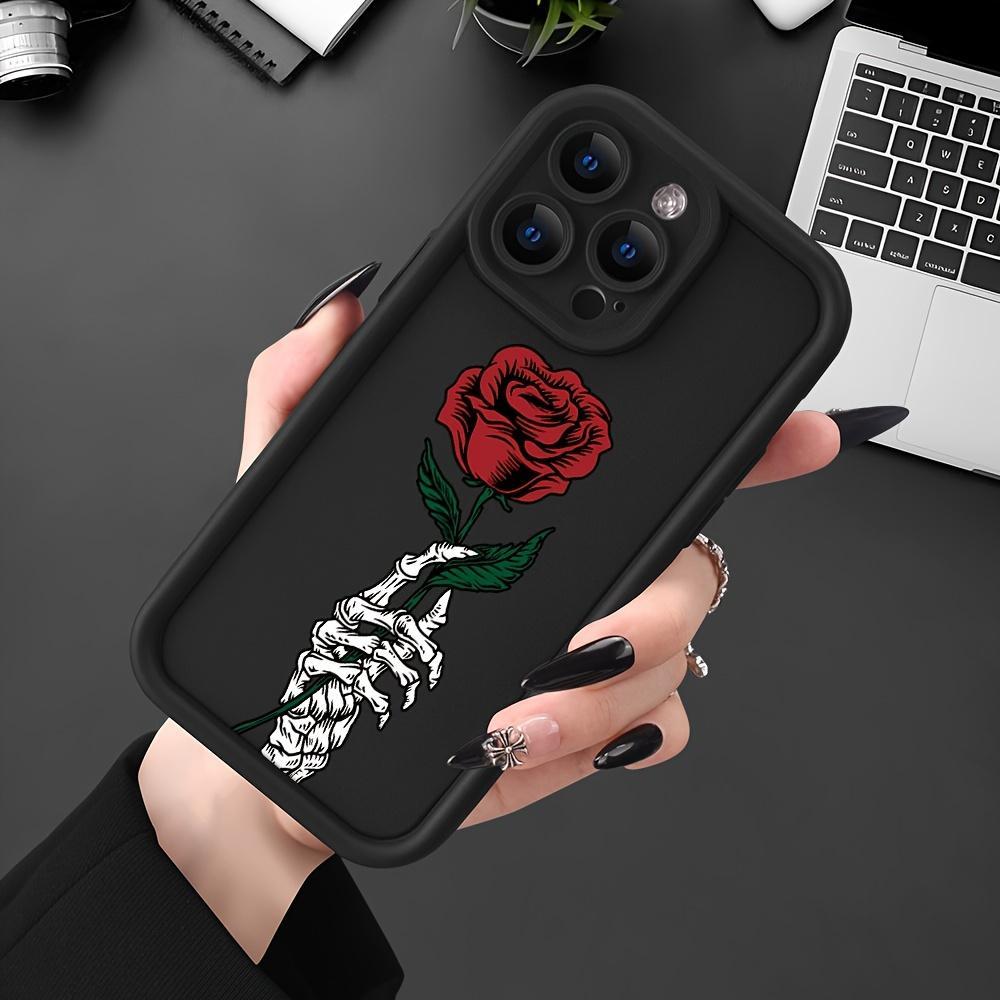 Black Phone Cover Designed for Iphone Models 16 Pro Max, 15 Plus, 14, 13, 12, 11, XR, And XS Featuring a Skull And Rose Design, Made from Anti-Scratch And Shockproof TPU Material for Drop Protection.