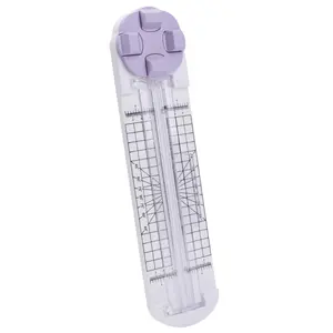 Multifunctional paper-cutting and scrapbooking tool featuring a bidirectional cutter; equipped with blades for straight, wavy, and perforated cuts, as well as a scoring blade—suitable for cutting paper, coupons, photos, and cards.