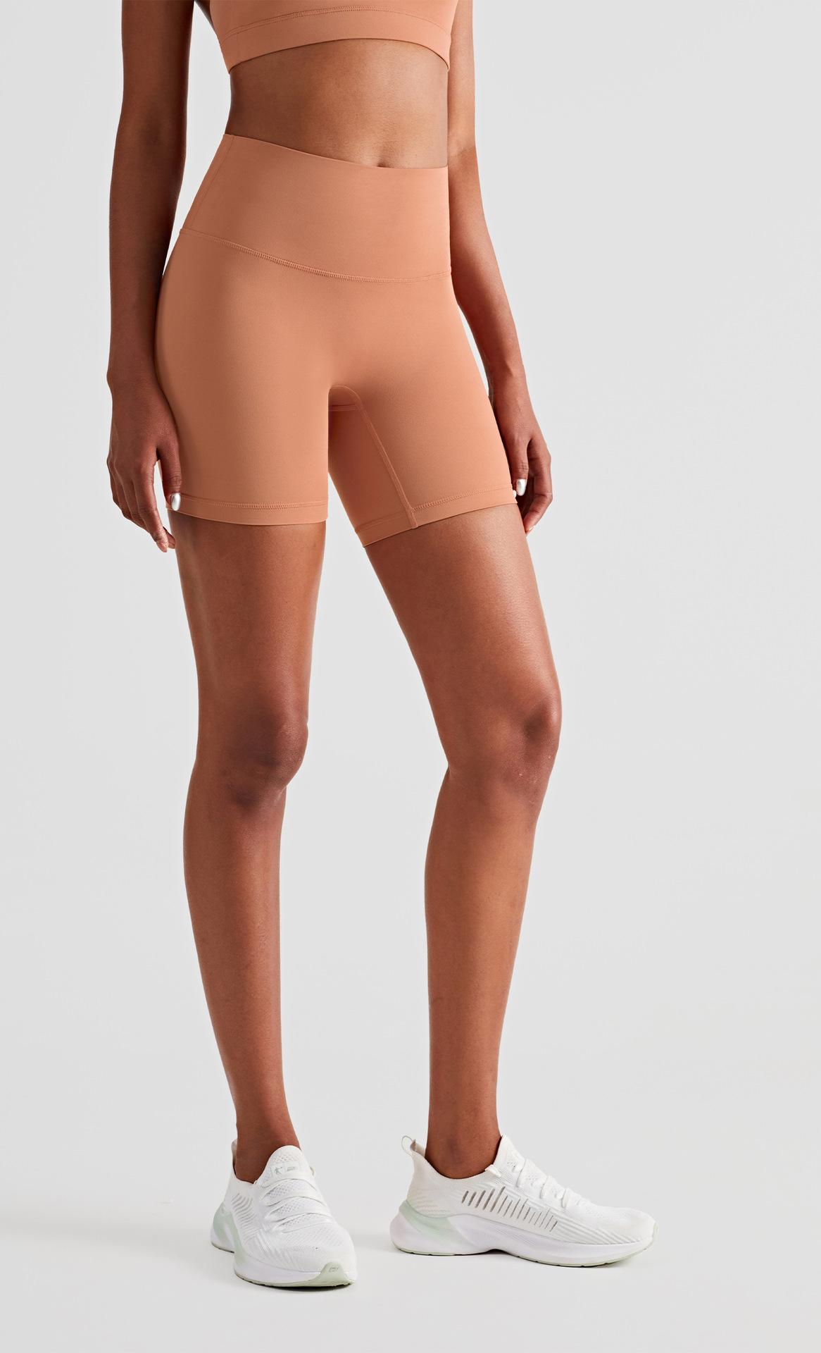 Spring and summer nude-feel running sports shorts for women, high-waisted, tummy-tightening, butt-lifting, three-quarter length pants for fitness, outdoor cycling, and yoga