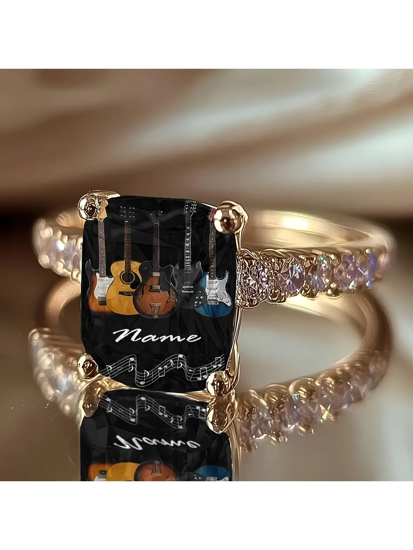 A variety of guitar-pattern customizable name-printed rings. The base color is black with a faceted design. It features guitar patterns of both acoustic and electric guitars.