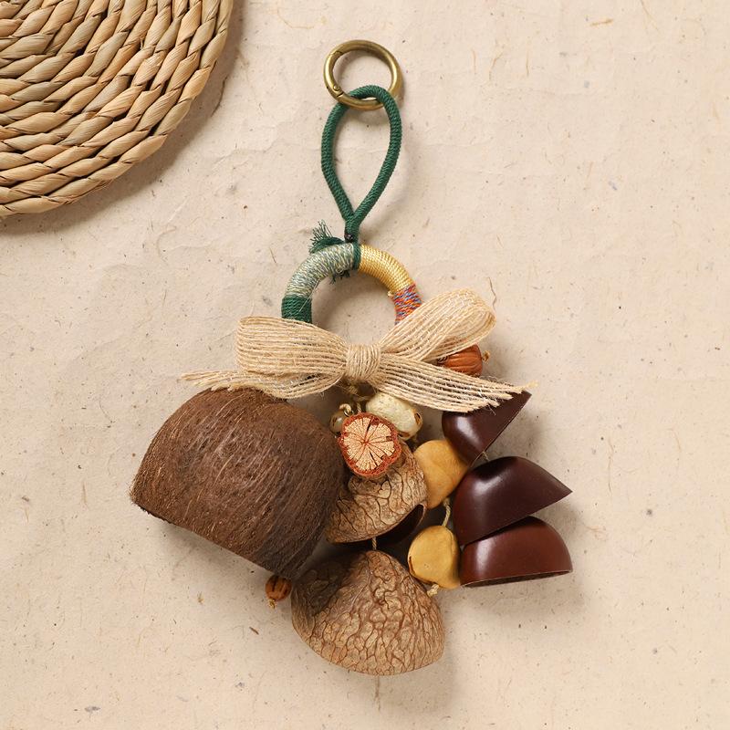 Naturally handcrafted fruit shell bell, with seeds, sound therapy handbell, wish-fulfilling fruit bag ornament, Yunnan specialty gift, mobile phone decoration accessory