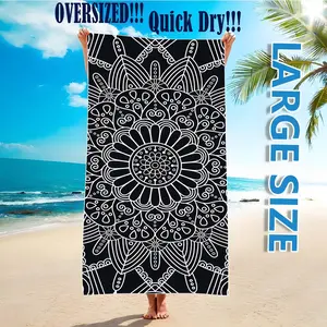 One microfiber black floral beach towel – lightweight and comfortable, suitable for swimming, diving, and summer fun. Dimensions: 71 x 31.5 inches.