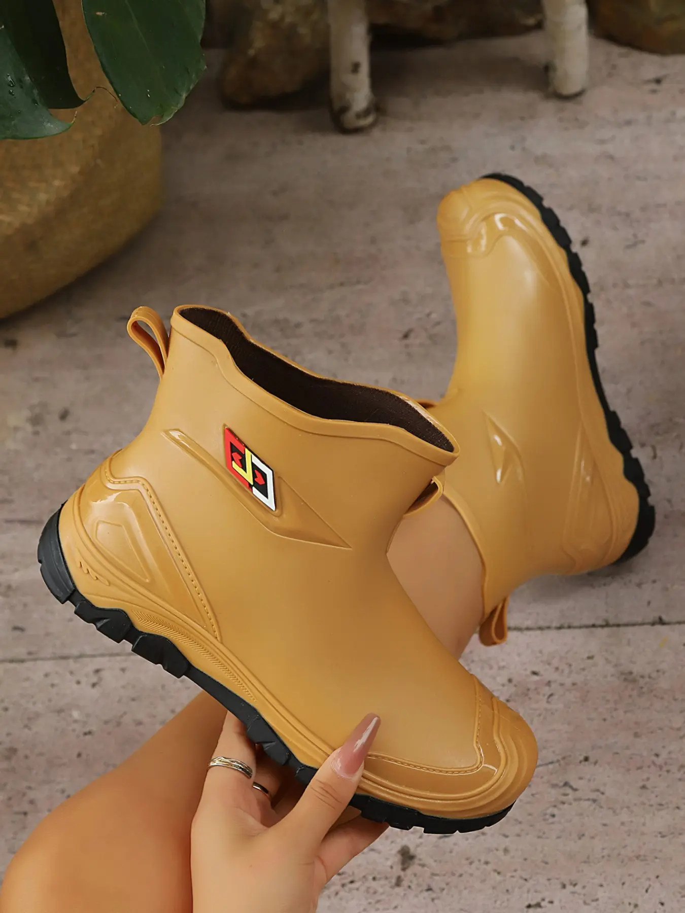 Women's Glossy Mustard Yellow Side Geometric Label Short Ankle Rain Boots, Integrated Waterproof Molded Upper Colorful Small Logo Tag Rear Pull Tab Deep Black Lug Chunky Sole Soft Fleece Lined Outdoor Garden Commute Casual Footwear