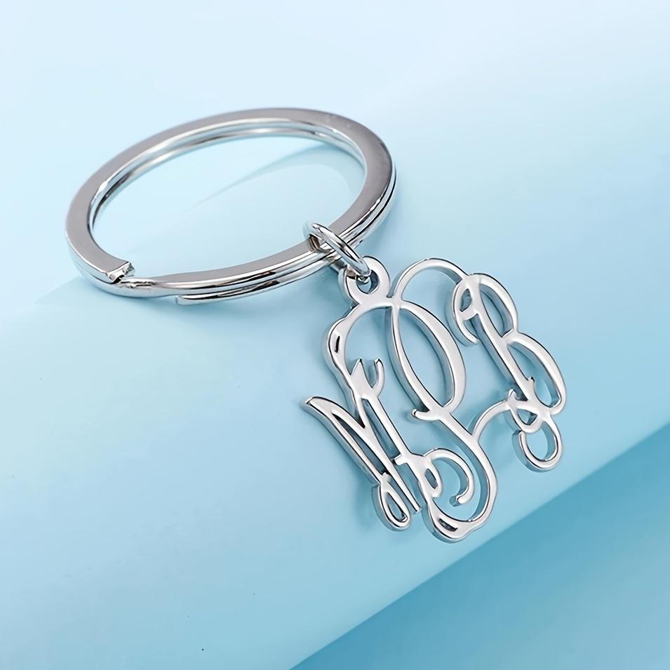 A Custom Letter Keychain Without a Chain - Elegantly Intertwined Letter Design, Unisex Heavy-Duty Key Ring - Perfect for Weddings, Anniversaries, And Birthday Gifts - Goldene Name Tag Pendant, Made of Stainless Steel, a Wedding Keepsake