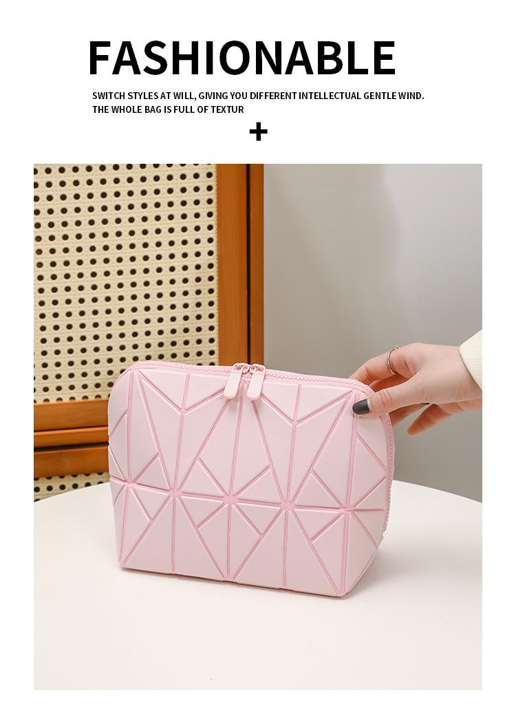 Diamond-shaped bag is super practical, large-capacity, and aesthetically pleasing. It is a storage bag for travel and commuting with a striped three-dimensional design, also suitable as a makeup bag