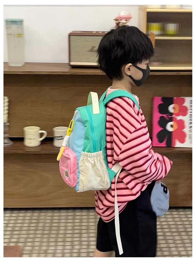 Boys' and girls' backpack 2026 new fashion color-blocking kindergarten baby school bag large capacity children's backpack