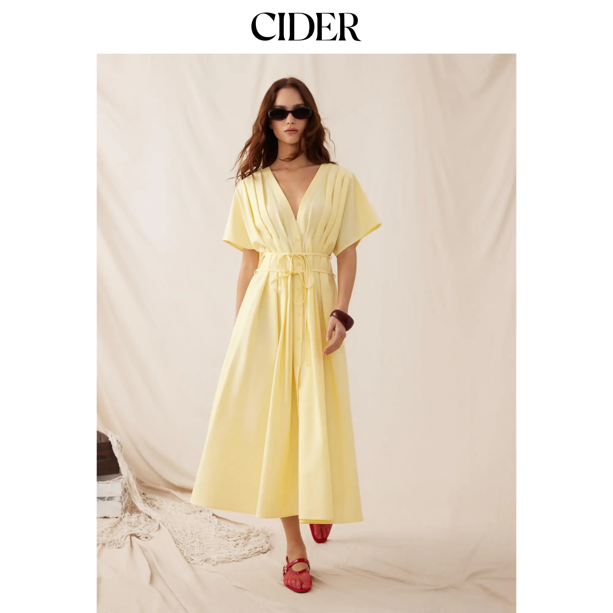 Cider Linen-blend V-neck Pleated Knotted A-line Maxi Dress