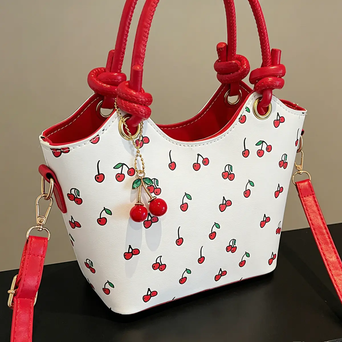 Women's Sweet PU Leather Bucket Bag - All-Over Cherry Graphic, Cherry Charm Pendant, Adjustable Detachable Strap, Top Double Handles, Zipper Closure, Compact Crossbody Bag, Casual Everyday Use (Do Not Wash)