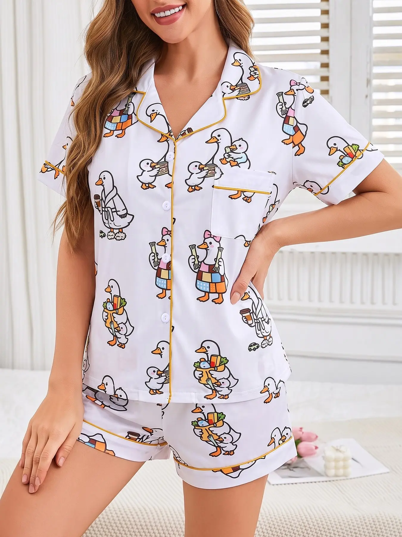 Women's 2-piece pajama set with cute cartoon duck print on white base, gold contrast piping. Lapel short sleeve top with chest pocket, soft elastic waist shorts, all-season Casual Loungewear Outfits for women daily home wear All Seasons Loungewear