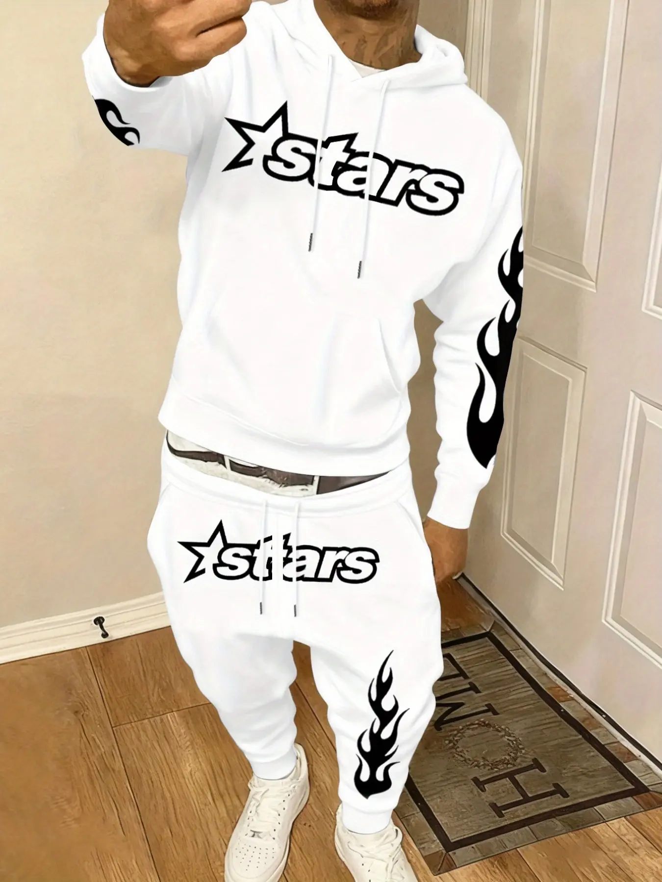 Men's Two-Piece Black-and-White Flame Print Tracksuit, Hoodie and Jogger Pants Set with Eye-Catching Stars Pattern. Made of Soft Fabric, Equipped with Adjustable Drawstrings, Kangaroo Pockets, Ribbed Cuffs and Hem. Loose Streetwear Style, Ideal for Hip-Ho