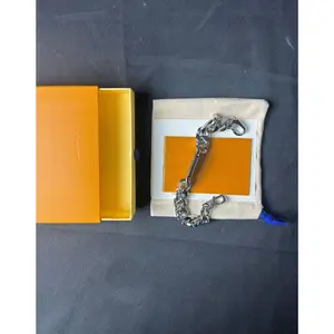 "Silver that speaks for you. ✨ Designer monogram plate on a 20cm chain — fixed length, intentional fit. For her, for him, for stacking. 🤍 #SilverJewelry #MonogramBracelet #TikTokShop"