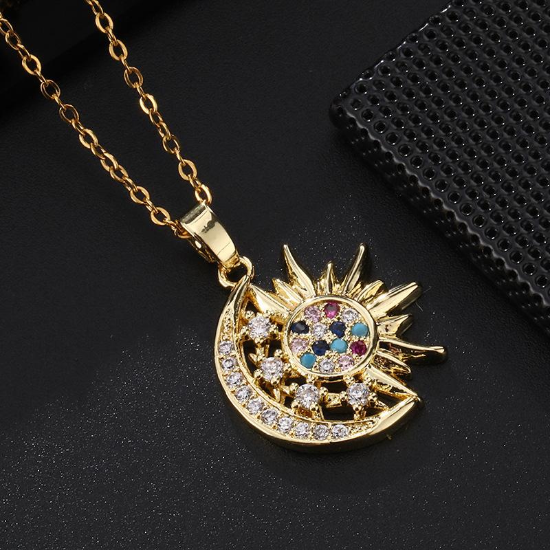 A 2-Piece Set: Sun and Moon Necklaces Adorned with Colorful Cubic Zirconia. Featuring a vintage-inspired design, this set embodies a blend of unique personal style and minimalist trends. It makes an ideal gift for sisters or classmates, and is equally per