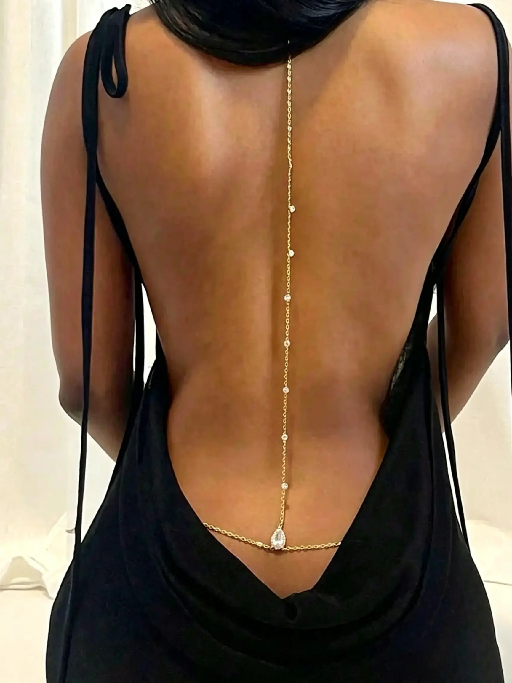 Sexy rhinestone choker with backless design, a unique body chain perfect for parties with backless dresses; simple crystal Waist Chain Accessory, suitable for everyday fashion accessories.
