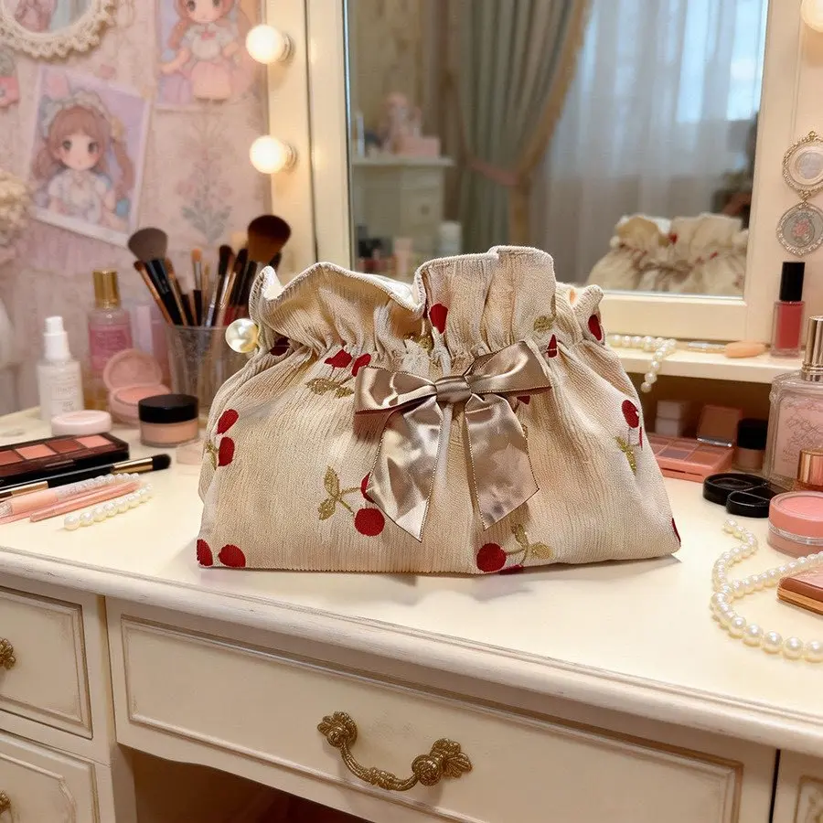 Sturdy corduroy drawstring cosmetic handbag with divided pockets for lipsticks and makeup brushes. Dustproof moisture-proof drawstring, thick anti-pilling fabric, stylish portable pouch for daily outings, long trips and dorm sorting.