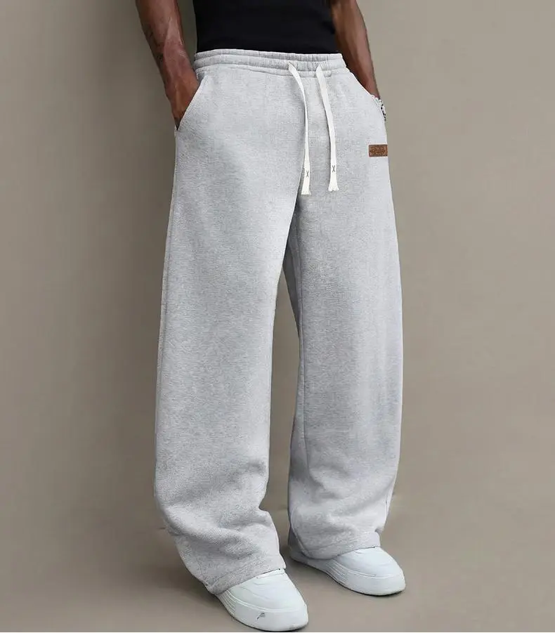 Men’s casual pants for autumn, cotton-blend stretch fabric, comfortable athletic-casual long pants with a loose straight fit; suitable for everyday wear and commuting; versatile sweatpants with drawstring; simple men’s casual pants. Men’s casual pants for autumn, cotton-blend stretch fabric, comfortable athletic-casual long pants with a loose straight fit; suitable for everyday wear and commuting; versatile sweatpants with drawstring; simple men’s casual pants.