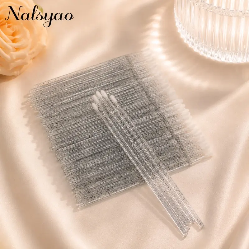 100 Pack Crystal Handle Micro Lash Brushes, Versatile for Mascara Application and Extension Removal. Fine Tips for Precise Brushing and Gentle Cleaning.