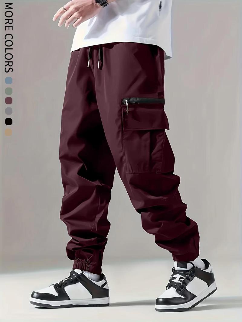 Men's solid color cargo pants with pockets and zippers, regular fit, durable and wear-resistant, suitable for everyday wear, street style men's casual trousers.