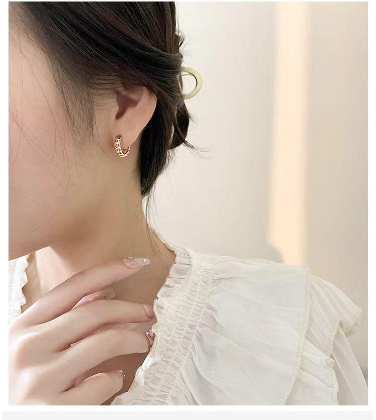 European and American retro style money earrings, versatile earrings, new fashionable plated hollowed-out copper coin ear buckles