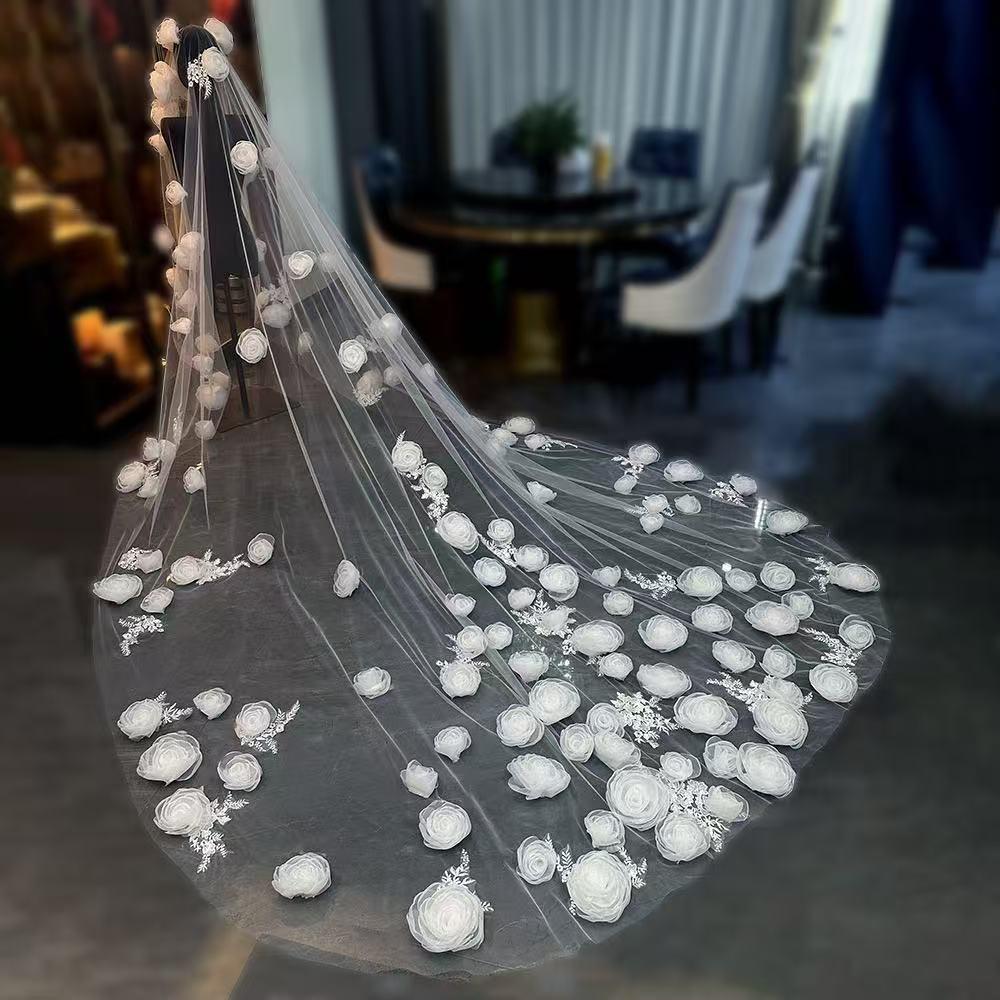 Luxury-style long veil with dreamy, elaborate floral designs and a cathedral-style train