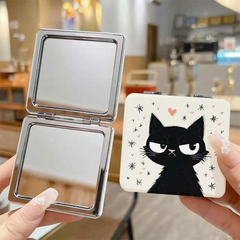 Grumpy Black Cat Folding Compact Mirror, Double‑Sided Portable Pocket Makeup Mirror, Sassy Black Kitten with Hearts & Star Burst Print, Travel Purse Mirror, Cute Gift for Cat Lovers, Girls & Women