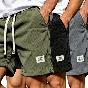Men’s corduroy drawstring loose casual shorts — American retro style, elastic waistband, straight cut, mid-thigh length; versatile for everyday wear and commuting; multi-pocket casual athletic shorts; trendy cool color-block label design, drawstring wide-