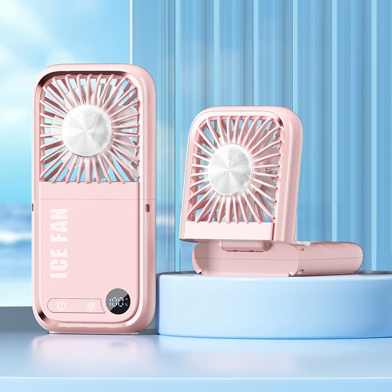 tylish and versatile personal fan with digital display, foldable design, and dual-use for neck hanging or handheld. Built with ice compress cooling technology, USB rechargeable, ultra-portable for outdoor, travel, office and daily use. Low noise, strong w