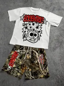 American Street Style Cartoon Graffiti Print T-Shirt + Camouflage Shorts Set, Unisex Casual Two-Piece, Loose-Fitting Fashion, Streetwear Outfit Clothes