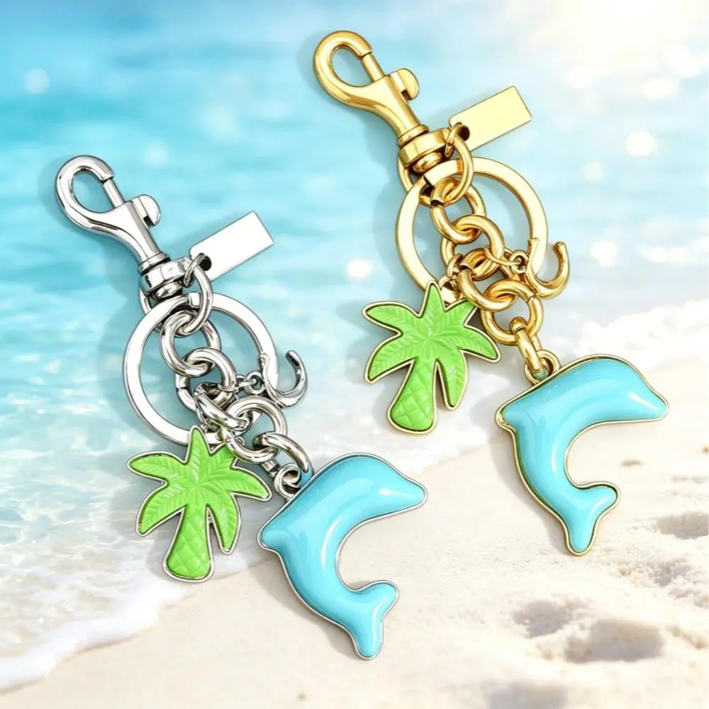 Enamel Bag Charm - Tropical Dolphin-Animal & Palm Tree-Plant Nautical Accessory with Gold Lobster Clasp, Beach Collectible for Travel & Daily Commute, Animals, Collectibles, Coastal, Plastic, Accessory Charm, Dual Motifs, Clasps, Glossy Finish, Scratchpro