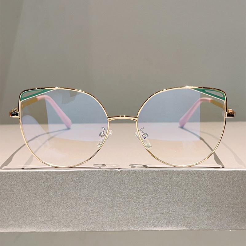 High quality cat eye hollow metal eyeglass frame fashion simple anti blue light glasses for women Computer goggles flat lens