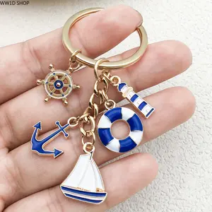 Sailing Boat Charm Keychain for Women and Men, Alloy Anchor and Lifebuoy Pendant Accessory for Backpacks, Wallets and Car Keys, Nautical Daily Carry Charm