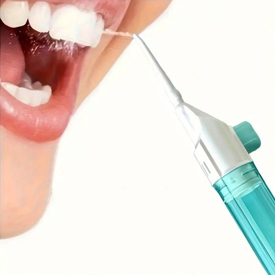 Portable manual high-pressure flusher, tooth washer.ABS material, high-pressure pulse technology, push-button design, detachable nozzle.No need for electric drive, suitable for family travel, essential supplies for dental cleaning and oral care.