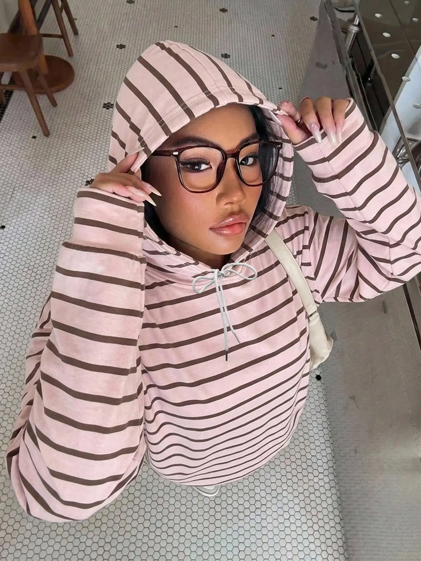 Women's pink striped hoodie, loose fit, casual pullover with a drawstring hood! Perfect for parties, commuting, daily walks, and weekend outfits. Trendy street style layering top, Wearable Hooded Sweatshirt, #stripedhoodie #casualhoodie #fallfashion