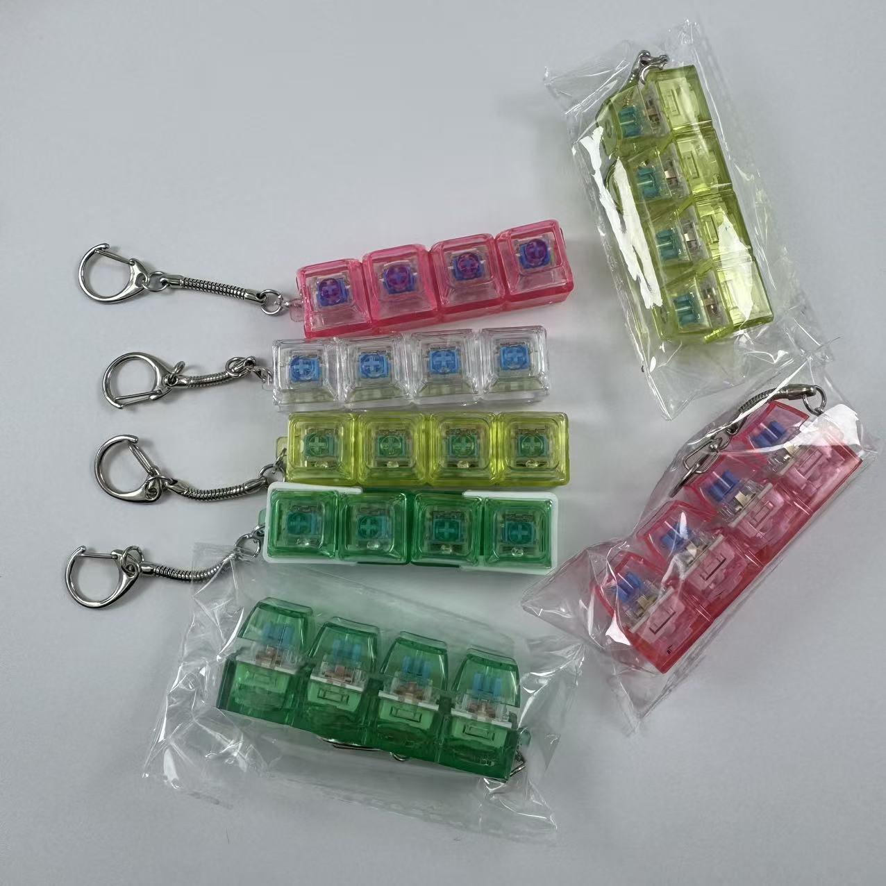 4-key decompression button, Russian Tetris keychain, mechanical key with light-emitting function, stress-reducing fingertip toy key.