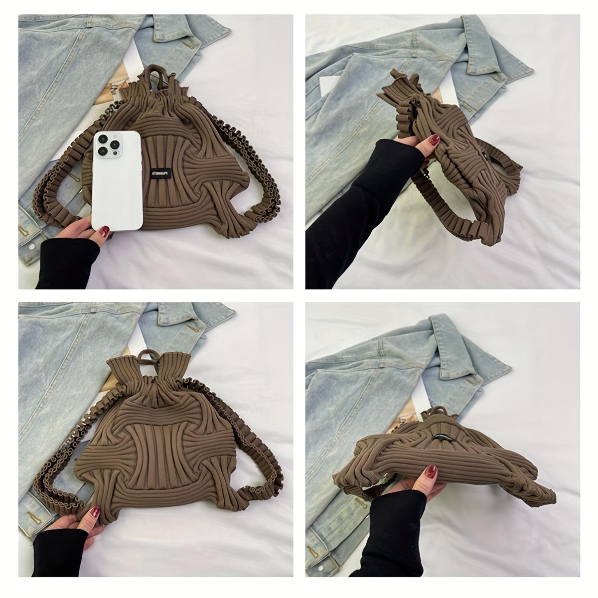 Fashionable new pleated texture knitted backpack with drawstring drawstring and elastic expansion, a versatile tool for casual travel/street fashion.It can be used for three purposes (back/lift/carry) and is a must-have for casual outings