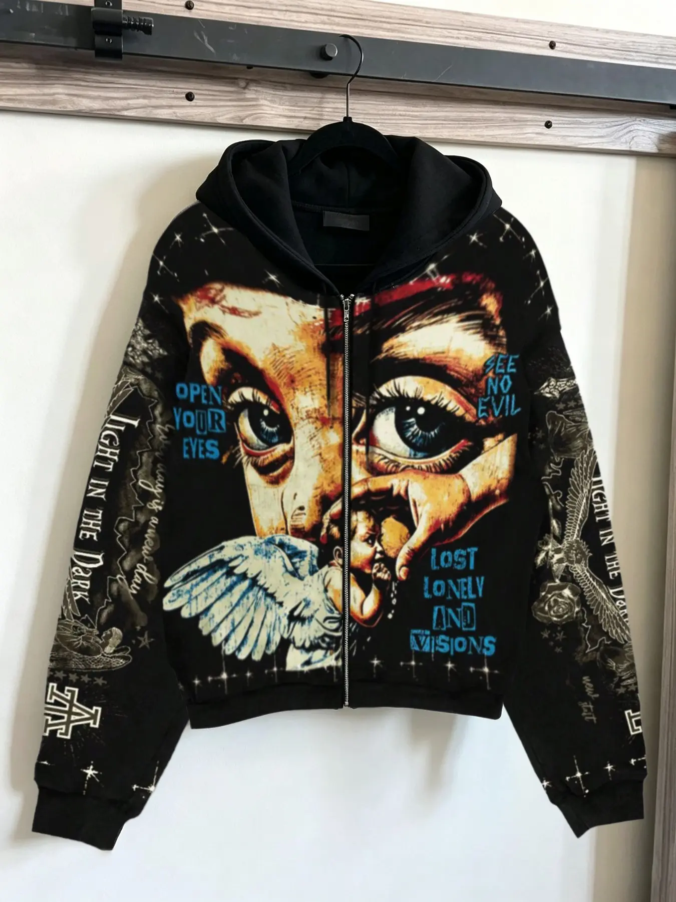 Unisex oversized zip-up hoodie featuring a vintage-style distressed "Little Angel" portrait print; a warm, fleece-lined, American high-street style long-sleeve hooded sweatshirt suitable for men and women.