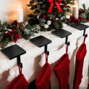 Christmas Stocking Holders for Mantle Set of 4 Heavy-Duty Cast Iron Xmas Stocking Hangers Hooks for Mantel with Protective Pad for Fireplace Home Shelf (Black)