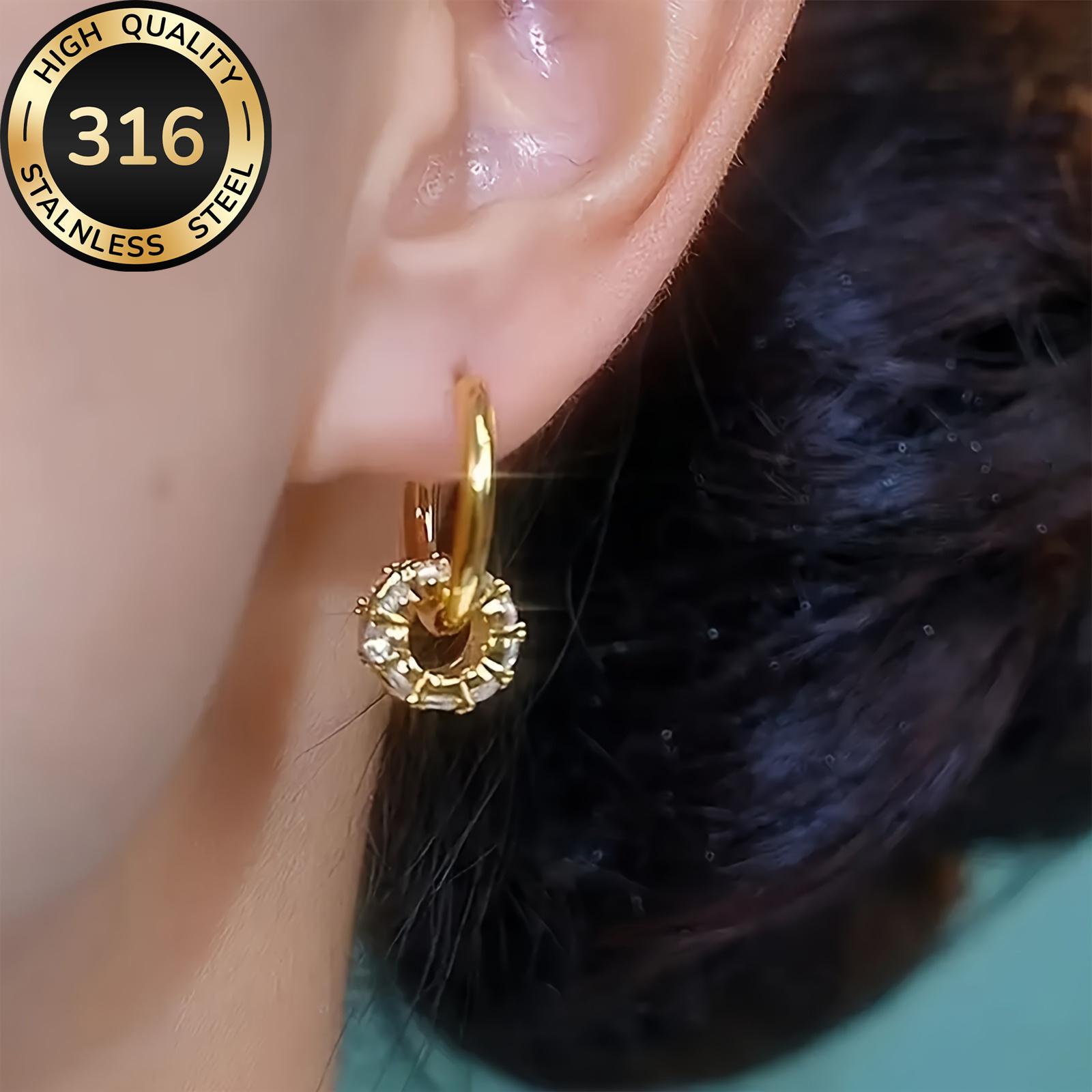 A pair of luxurious hoop earrings made of hypoallergenic 316 stainless steel with synthetic zirconia stones, featuring a minimalist design, a jewelry gift for women.