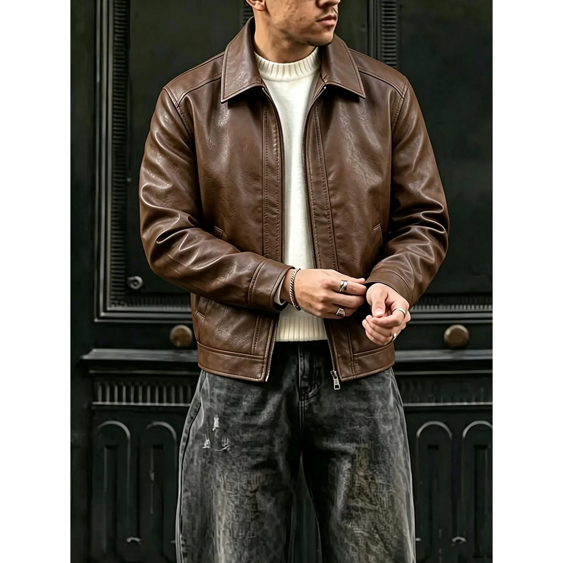 Men's tailored PU leather jacket with a lapel design.The meticulous hand-stitching enhances the texture.The minimalist design is perfect for street style and semi-occasional wear.