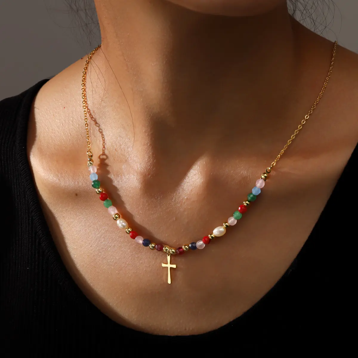 Women's vacation-style cross pendant necklace featuring multicolored natural stone beads, adjustable length, a bohemian-style necklace that draws attention to the collarbone, and faith-themed jewelry accessories