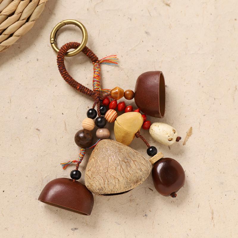 Naturally handcrafted fruit shell bell, with seeds, sound therapy handbell, wish-fulfilling fruit bag ornament, Yunnan specialty gift, mobile phone decoration accessory