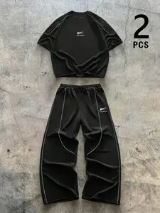 Men's Black White Contrast Stripe THE STAR Logo Print Crew Neck Short Sleeve T Shirt Wide Leg Drawstring Sweatpants 2 Pcs Co Ord Set, Loose Street Fit, Soft Breathable Knit Fabric, Summer Sporty Trendy Daily Casual Two Piece Outfit