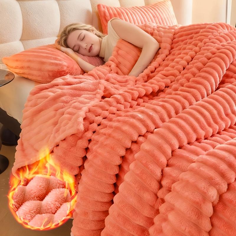 Extra-large blanket, measuring 108 inches by 90 inches, with a thickness that offers softness and comfort. This reversible blanket is made of faux rabbit fur material, crafted from warm fleece, and is perfect for naps and use in air-conditioned spaces.